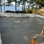Coulage de plancher en béton avec pompe dans les Laurentides.